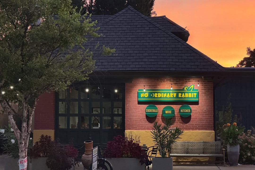The No Ordinary Rabbit storefront on Tower Grove Avenue at dusk