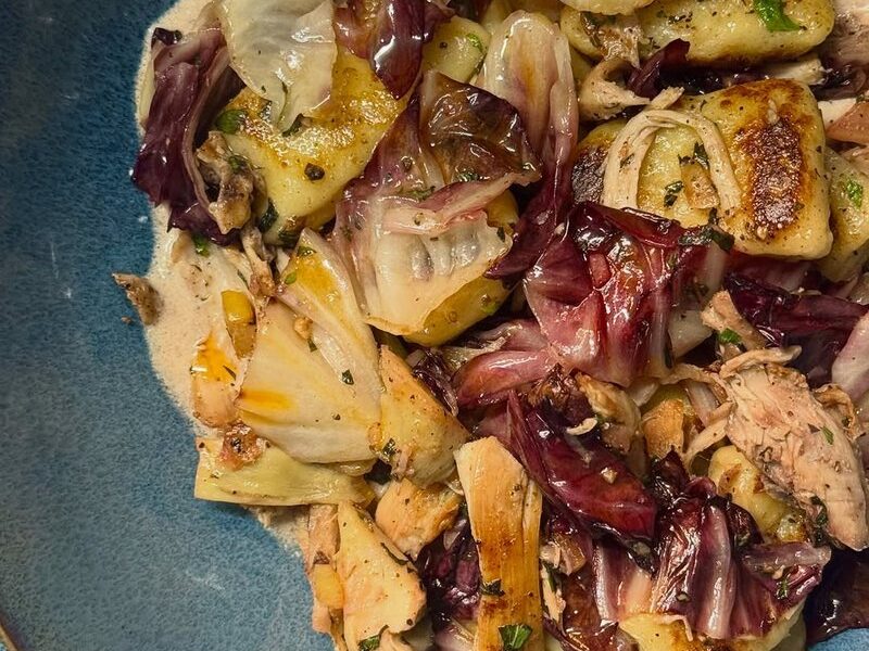 Pan seared gnocchi with braised chicken, artichokes and radicchio